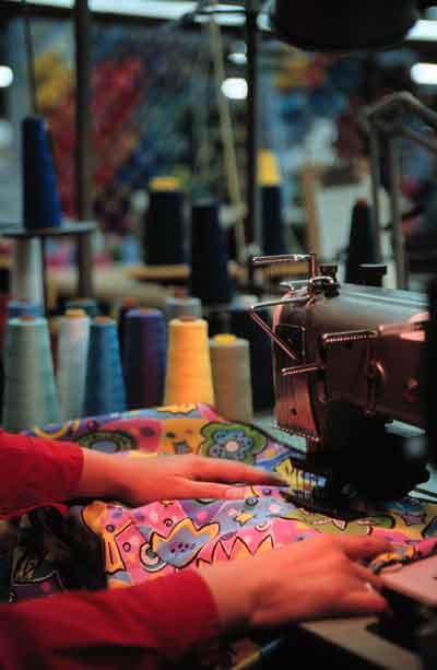 Woman's Hands at Sewing Machine